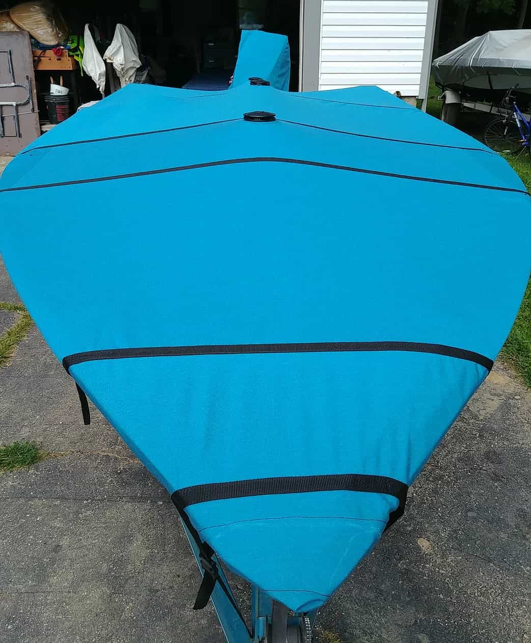 Precision stitched custom blue boat cover showcasing industrial sewing craftsmanship for marine protection